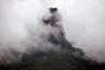Mountain enveloped in clouds