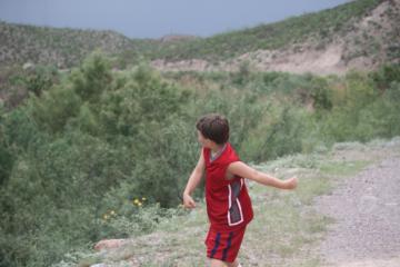Robert throws a rock too