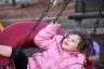 Emily on the tire swing