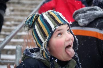 Robert waits for a snow flake